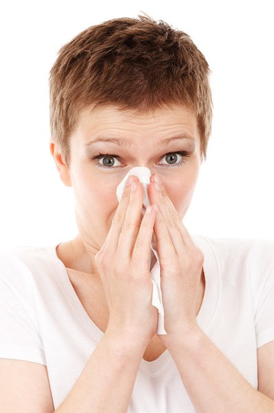 Woman with nasal congestion
